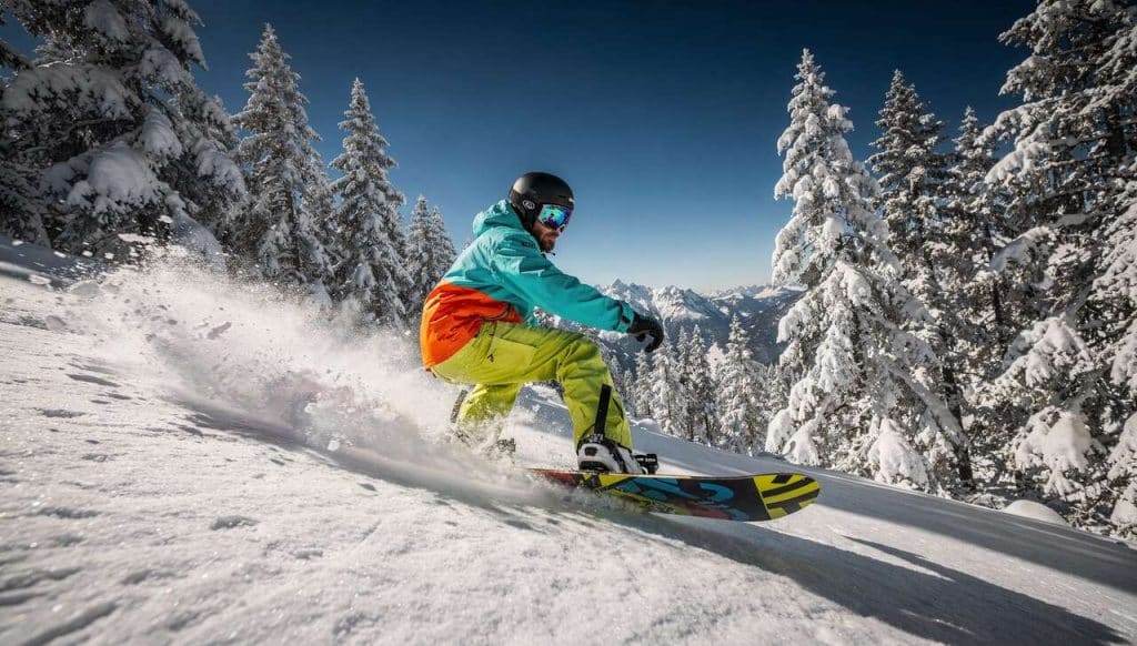 Guide complet pour réussir vos premières descentes en snowboard